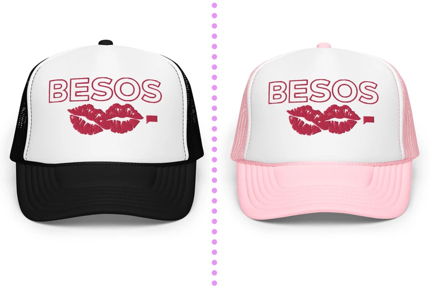 a black trucker hat and a pink trucker hat both with Besos and two lip icons on them