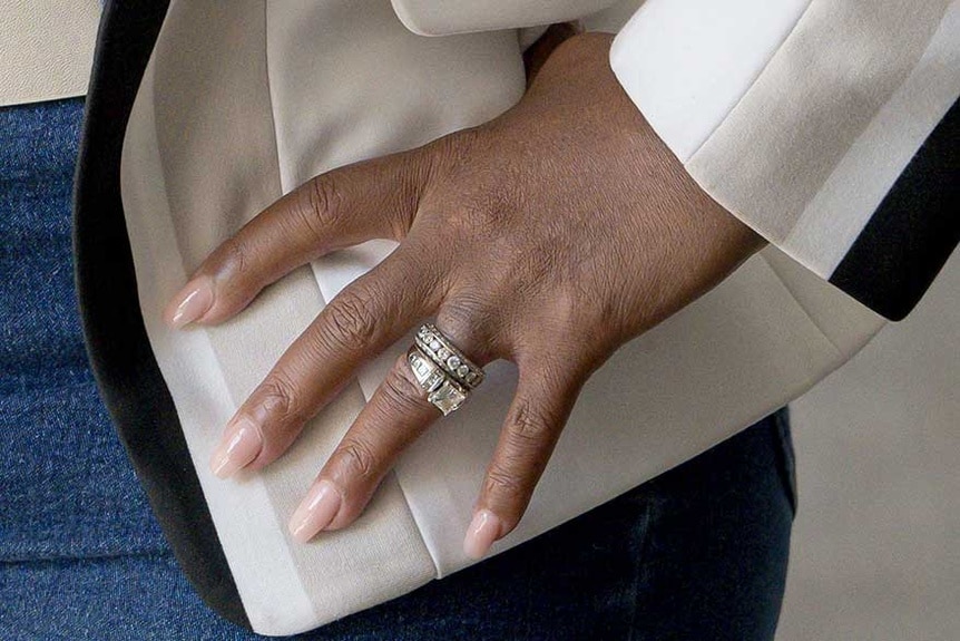 A closeup of Dr. Heavenly Kimes' engagement ring and wedding band.