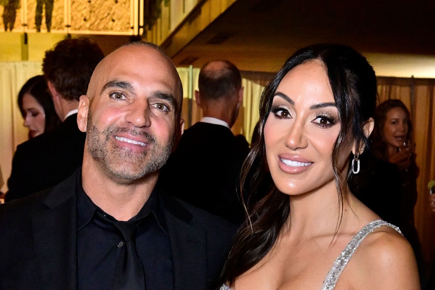 Melissa Gorga and Joe Gorga smiling together at an event.