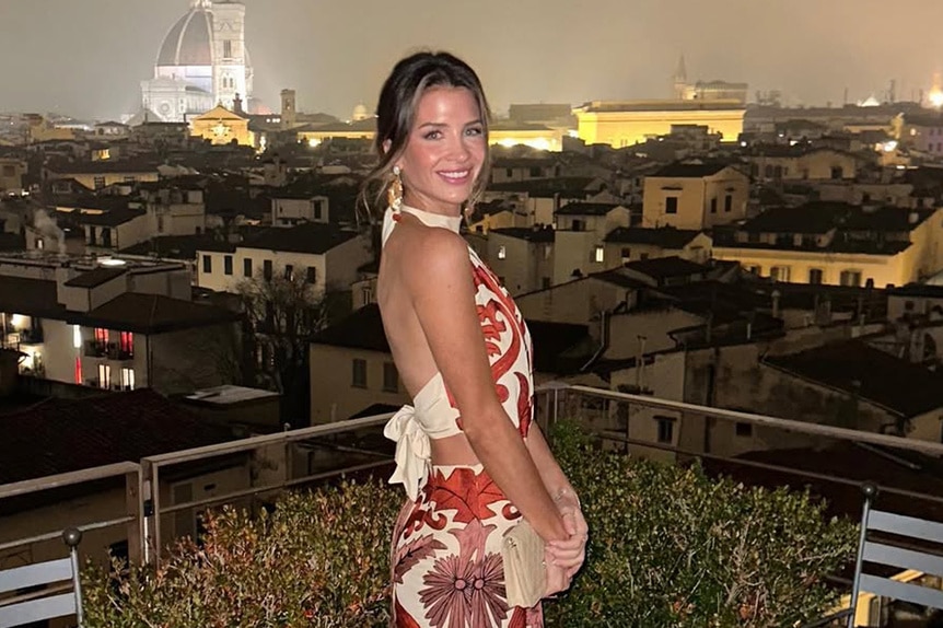 Naomie Olindo on a balcony in Florence Italy