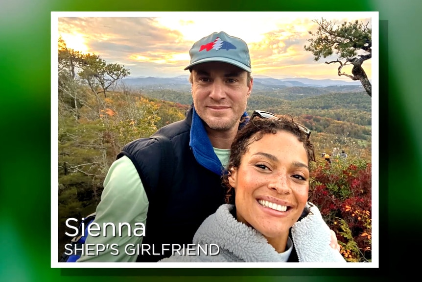 Shep Rose and his girlfriend Sienna Evans overlooking a mountain scape together