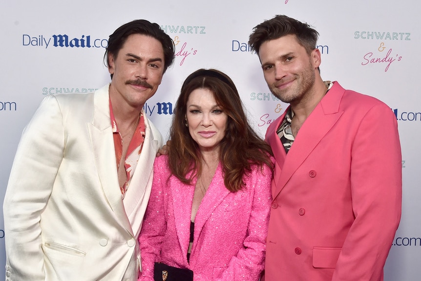 Tom Sandoval, Lisa Vanderpump, and Tom Schwartz on the red carpet.