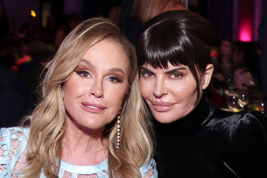 Kathy Hilton and Lisa Rinna smiling together at an event.