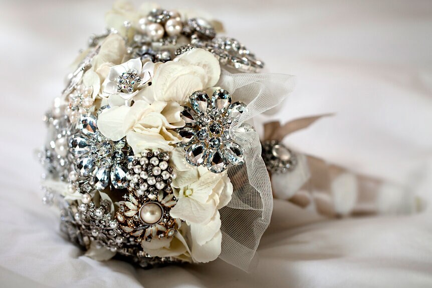 Brooch bouquet with sale real flowers